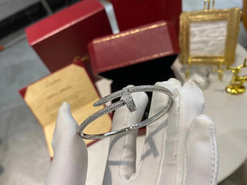 Close-up detail view of Cartier unisex jewelry piece