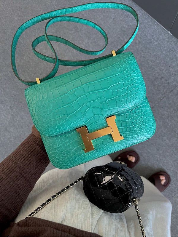 Side view of fluid structured handbag