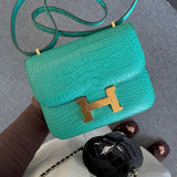 Side view of fluid structured handbag