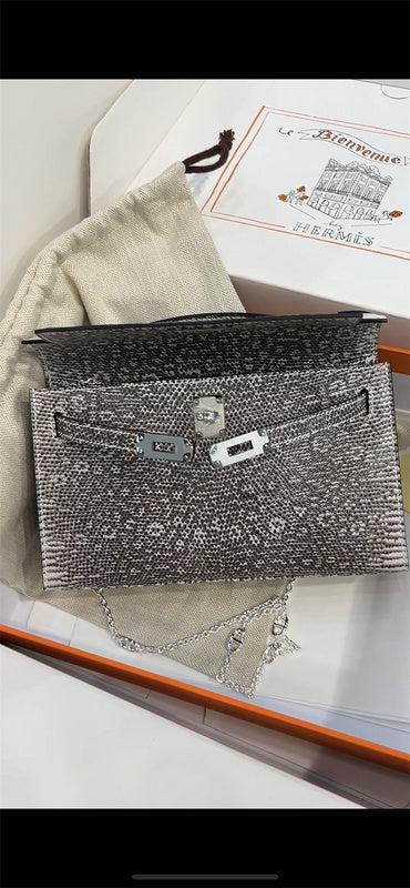  Elegant structured bag carried on shoulder