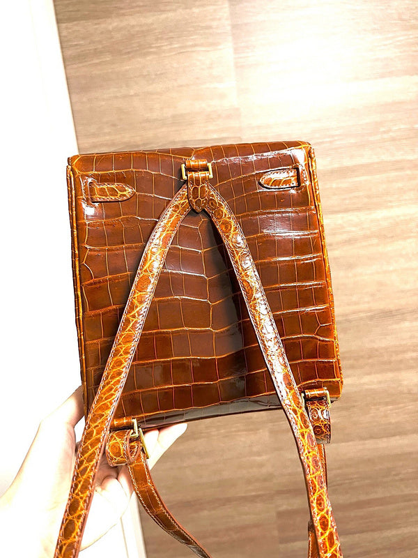 Side view of sculpted structured handbag