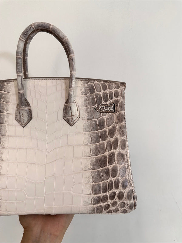  Statement crossbody bag carried on shoulder 10