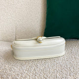 Styled lifestyle shot of premium sleek women's handbag – women's luxury accessory