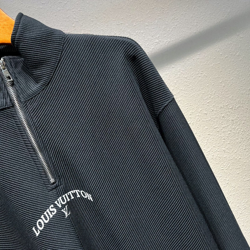Flat lay presentation of Louis Vuitton luxury clothing with monogram-inspired silhouette
