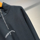 Flat lay presentation of Louis Vuitton luxury clothing with monogram-inspired silhouette