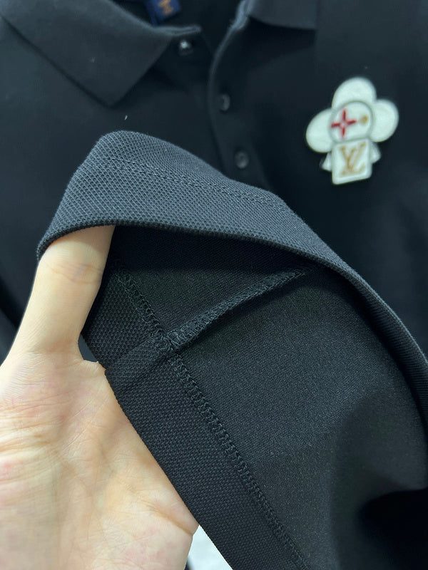 Side profile of Louis Vuitton luxury clothing with label-forward styling