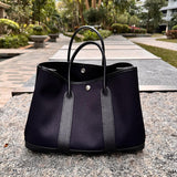 Side view of statement structured handbag