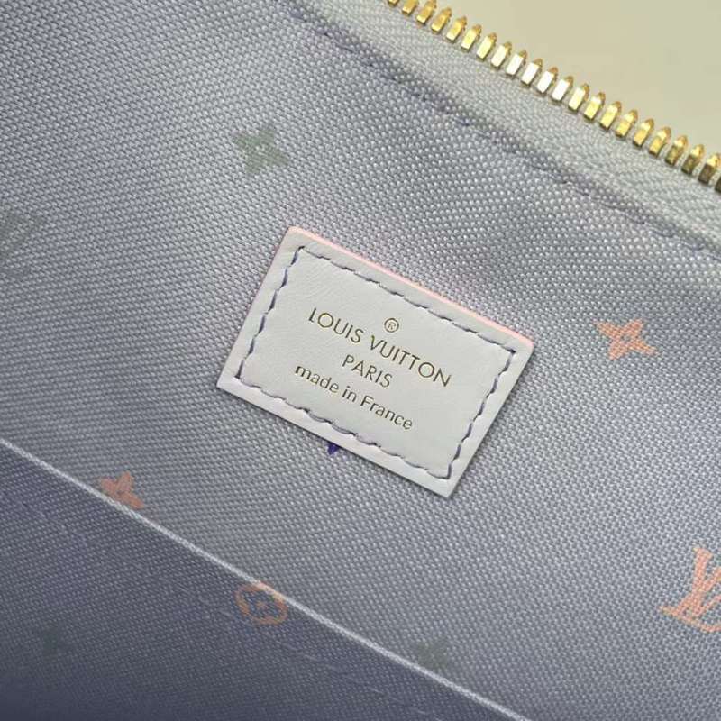 Side profile of signature statement women's handbag – women's designer-style accessory
