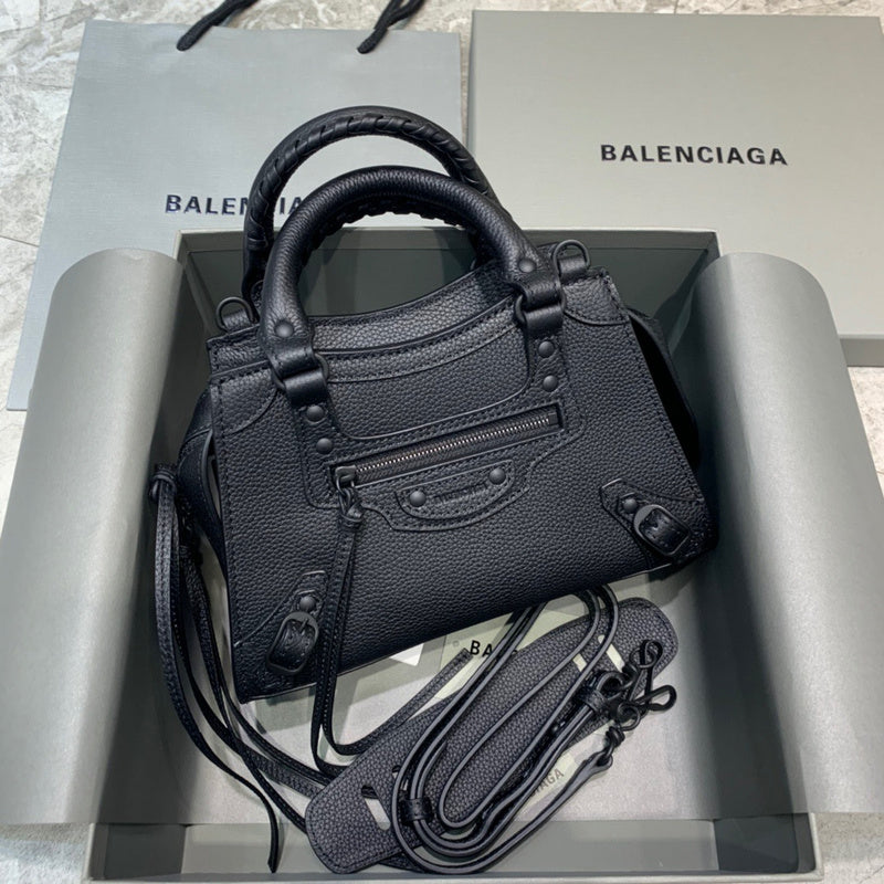 Classic Vegan Leather Handbag - Understated Luxury Look | Women's Everyday Carry Handbag #318 - side angle view (image 2) of designer-inspired handbag