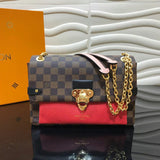 Front view of statement polished women's handbag – women's luxury accessory