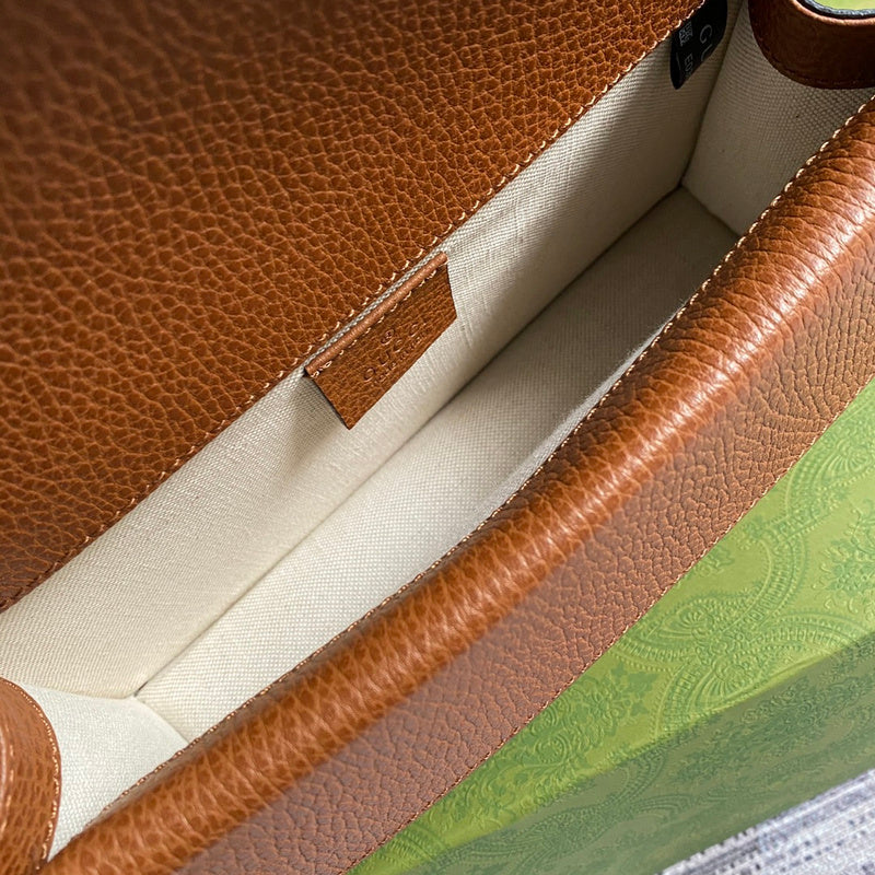 Side profile of premium statement women's handbag – women's luxury accessory
