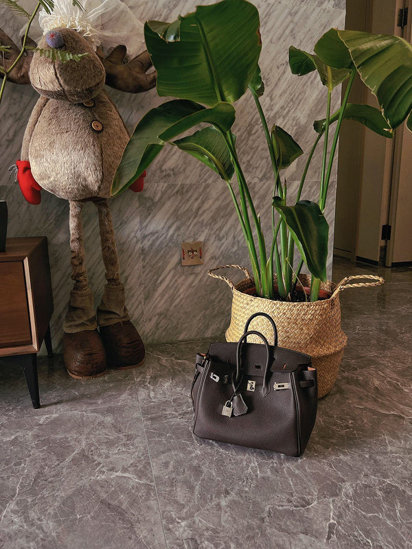 Side view of tailored structured handbag