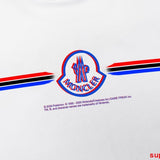 Close-up detail shot of Moncler luxury clothing with logo-detail design