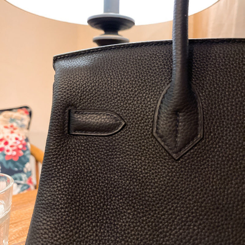 Sculpted handbag styled for everyday wear