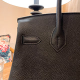 Sculpted handbag styled for everyday wear
