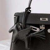 Structured top-handle bag carried on shoulder