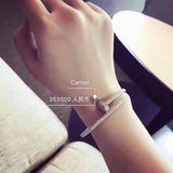 Lifestyle view of Cartier unisex jewelry piece