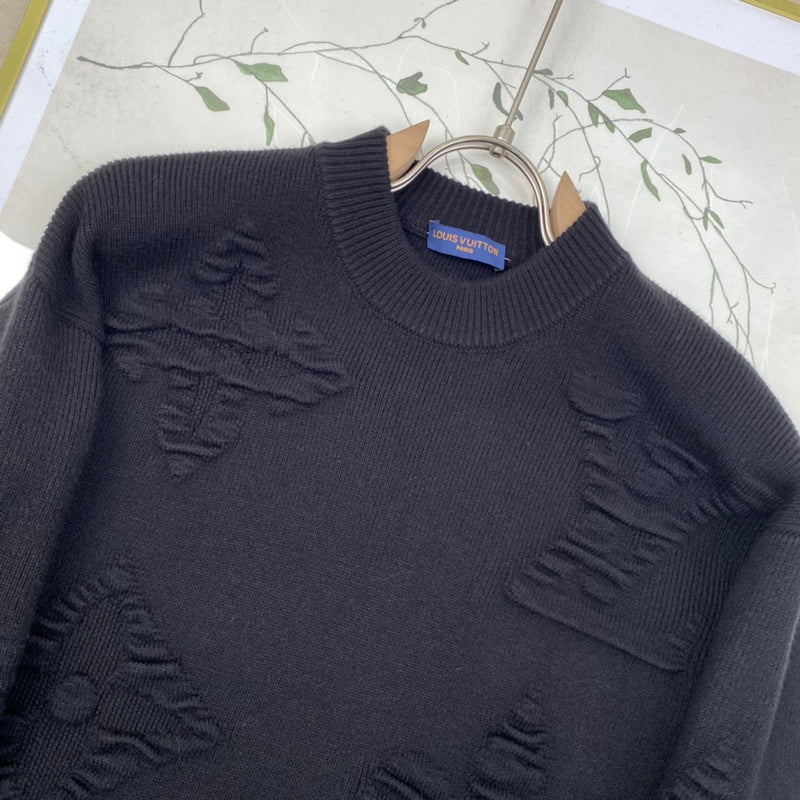 Close-up detail shot of Louis Vuitton luxury clothing with relaxed-fit cut