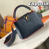 Front view of modern polished women's handbag – women's statement bag