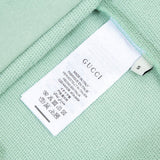 Close-up detail shot of Gucci luxury clothing with contemporary cut