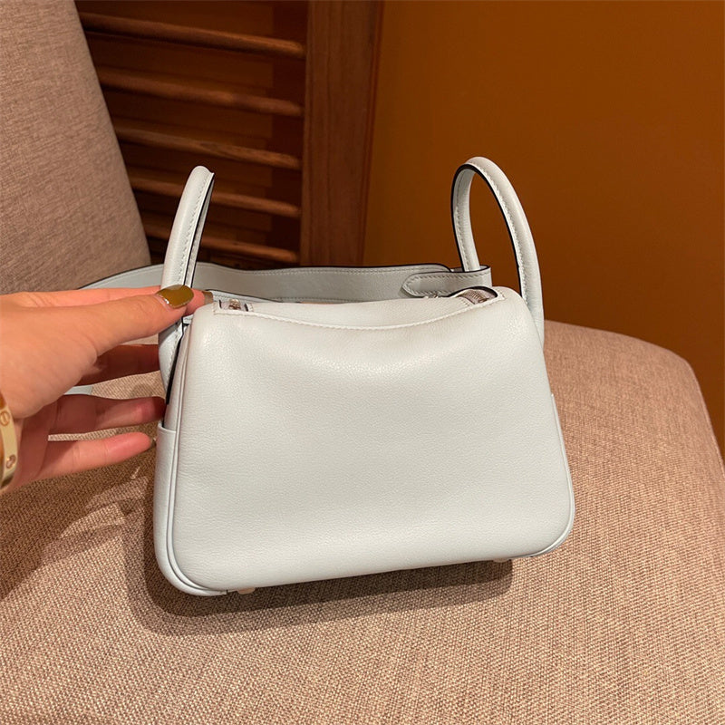  clean-lined carryall bag styled with outfit