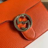 Handle and strap detail of structured polished women's handbag – women's luxury accessory