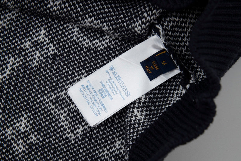 Close-up detail shot of Louis Vuitton luxury clothing with contemporary cut