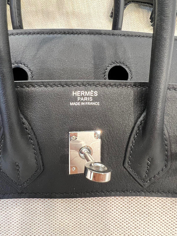 Side view of considered structured handbag