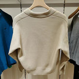 Front view of Lacoste luxury clothing with monogram-inspired silhouette