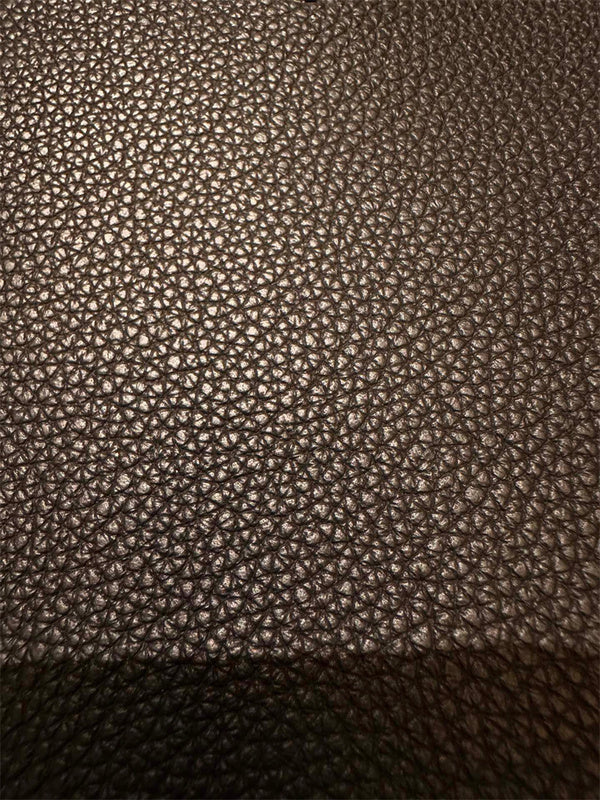  sophisticated top-handle bag detail view showing craftsmanship