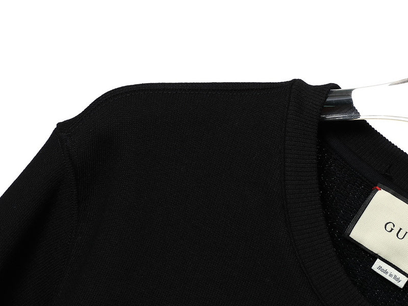 Front view of Gucci luxury clothing with tailored silhouette