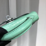 Side view of sophisticated structured handbag