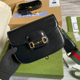 Side profile of structured signature women's handbag – women's luxury accessory