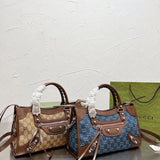 Ziva's Charm handbag – side angle view (one versatile size)