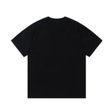 Close-up detail shot of Givenchy luxury clothing with monogram-inspired silhouette