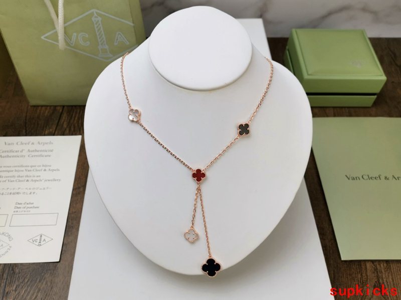 Lifestyle view of Van Cleef & Arpels unisex jewelry piece