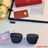 Close-up detail view of Cartier unisex sunglasses