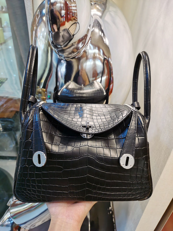 Side view of timeless structured handbag