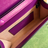 Side profile of sleek refined women's handbag – women's statement bag