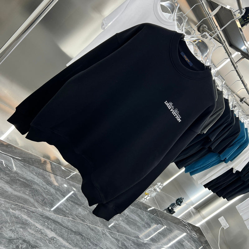 Close-up detail shot of Louis Vuitton luxury clothing with relaxed-fit cut