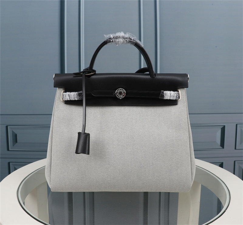 Side view of minimalist structured handbag