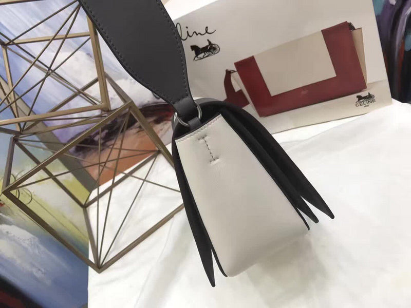 Styled lifestyle shot of modern refined women's handbag – women's luxury accessory