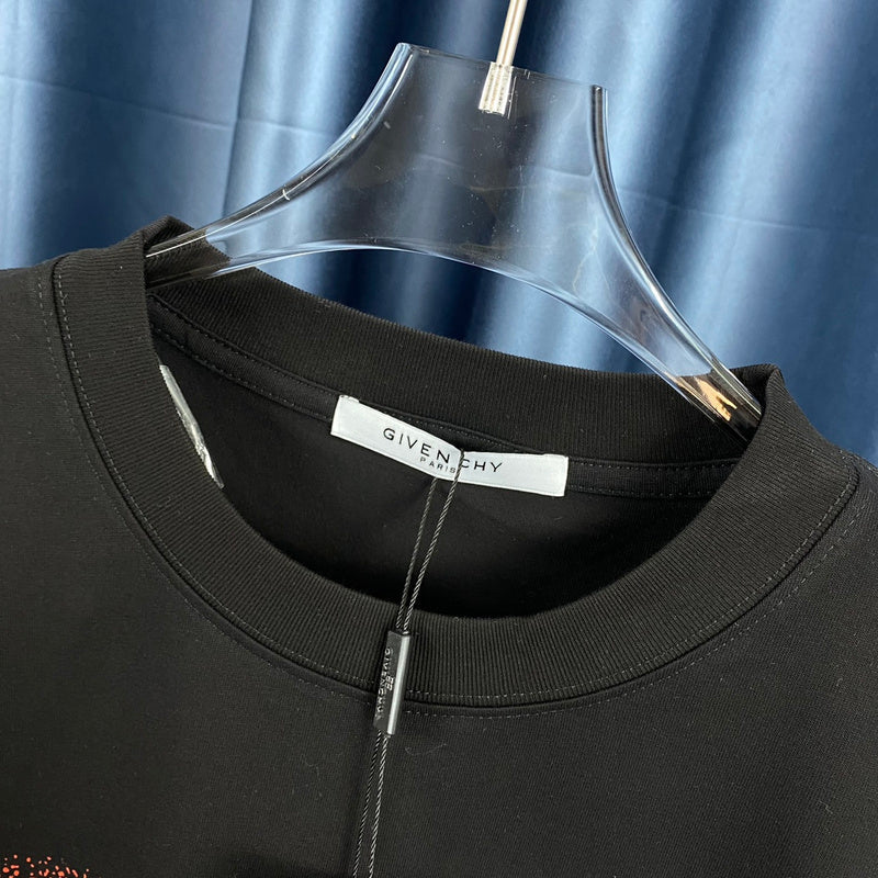 Full styled look of Givenchy luxury clothing with monogram-inspired silhouette