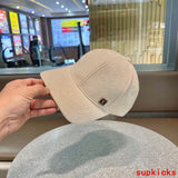 Side view of Louis Vuitton unisex cap