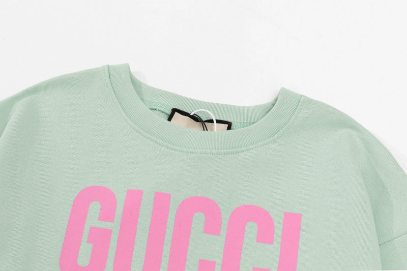 Close-up detail shot of Gucci luxury clothing with tailored silhouette