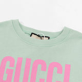 Close-up detail shot of Gucci luxury clothing with tailored silhouette