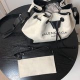 Back view of statement structured women's handbag – women's luxury accessory
