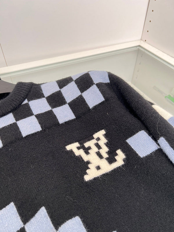 Flat lay presentation of Louis Vuitton luxury clothing with contemporary cut