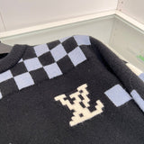 Flat lay presentation of Louis Vuitton luxury clothing with contemporary cut