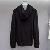 Side profile of Gucci luxury clothing with logo-detail design